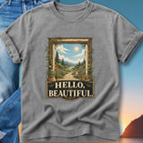 Gray t-shirt with framed landscape and "Hello, Beautiful." text.