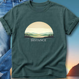 T-shirt with sunset landscape and the word "DISTANCE" on it.