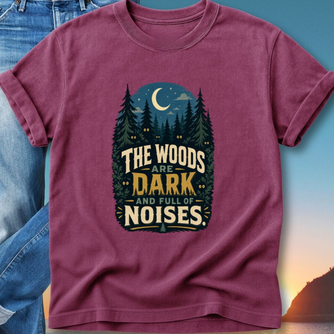 T-shirt with text "The woods are dark and full of noises" and forest illustration.