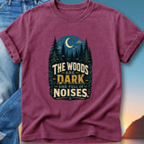 T-shirt with text "The woods are dark and full of noises" and forest illustration.