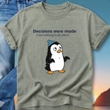 T-shirt with cartoon penguin wearing a blue beanie, text reads "Decisions were made".