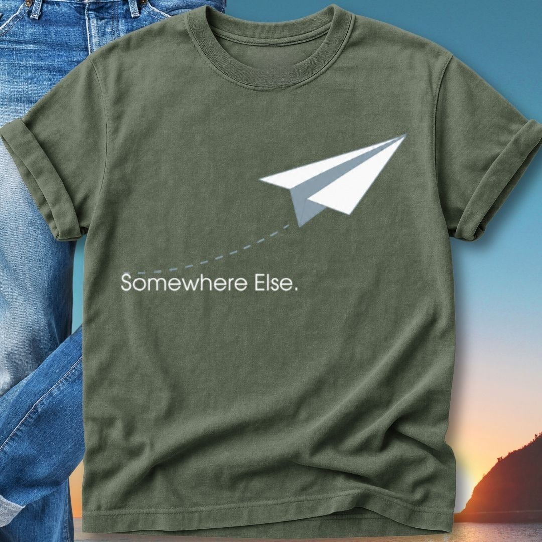 Green t-shirt with white paper airplane and "Somewhere Else." text.