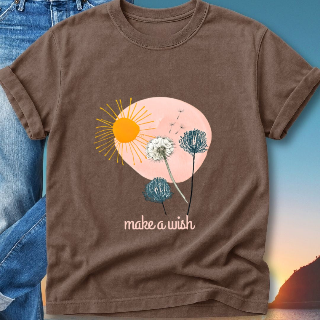Brown t-shirt with graphic of a sun, dandelions, and text "make a wish".