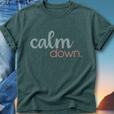Dark green t-shirt with "calm down." text.