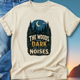 T-shirt with "The Woods Are Dark And Full Of Noises" text and forest design.
