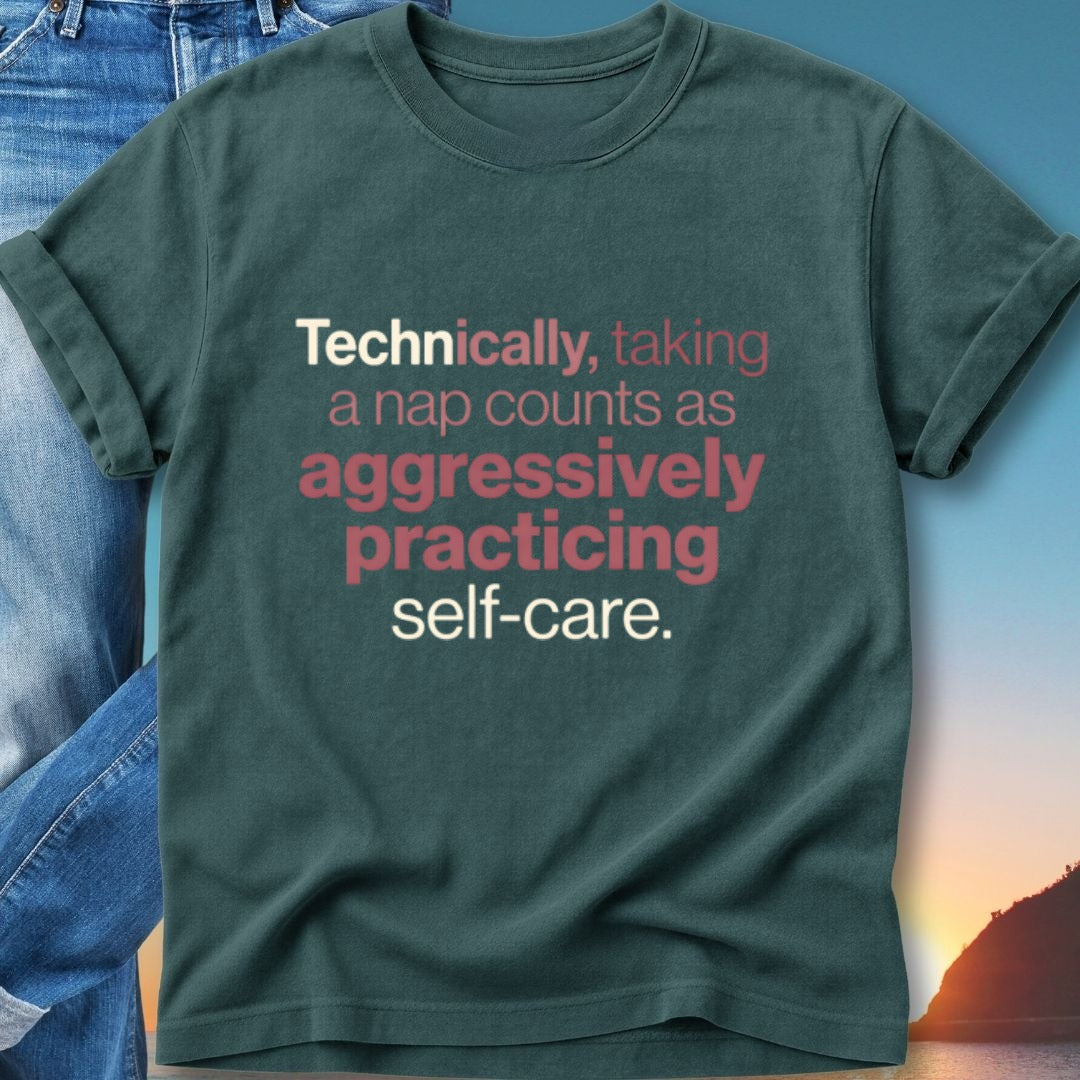 T-shirt with text "Technically, taking a nap counts as aggressively practicing self-care."