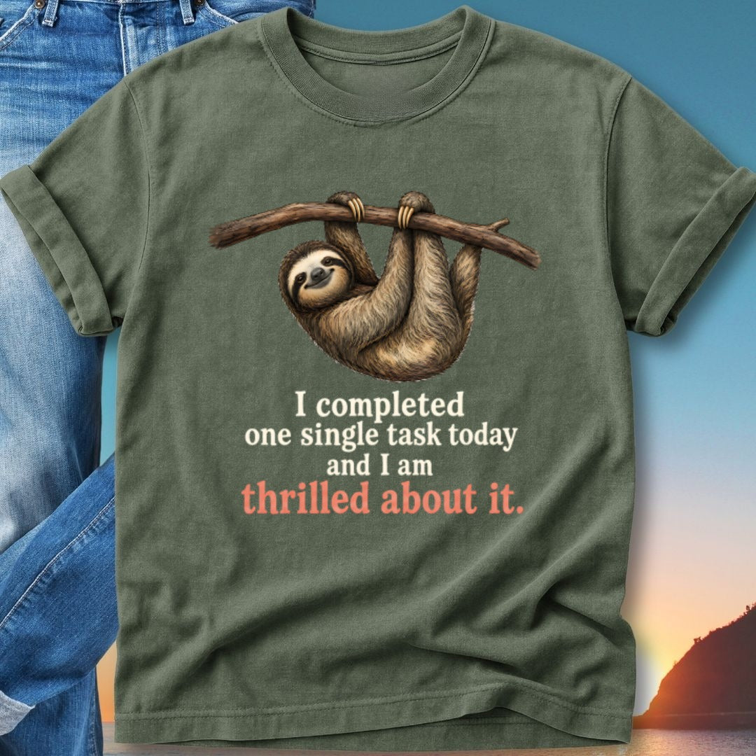 Green t-shirt with sloth hanging from a branch, text "I completed one single task today and I am thrilled about it."