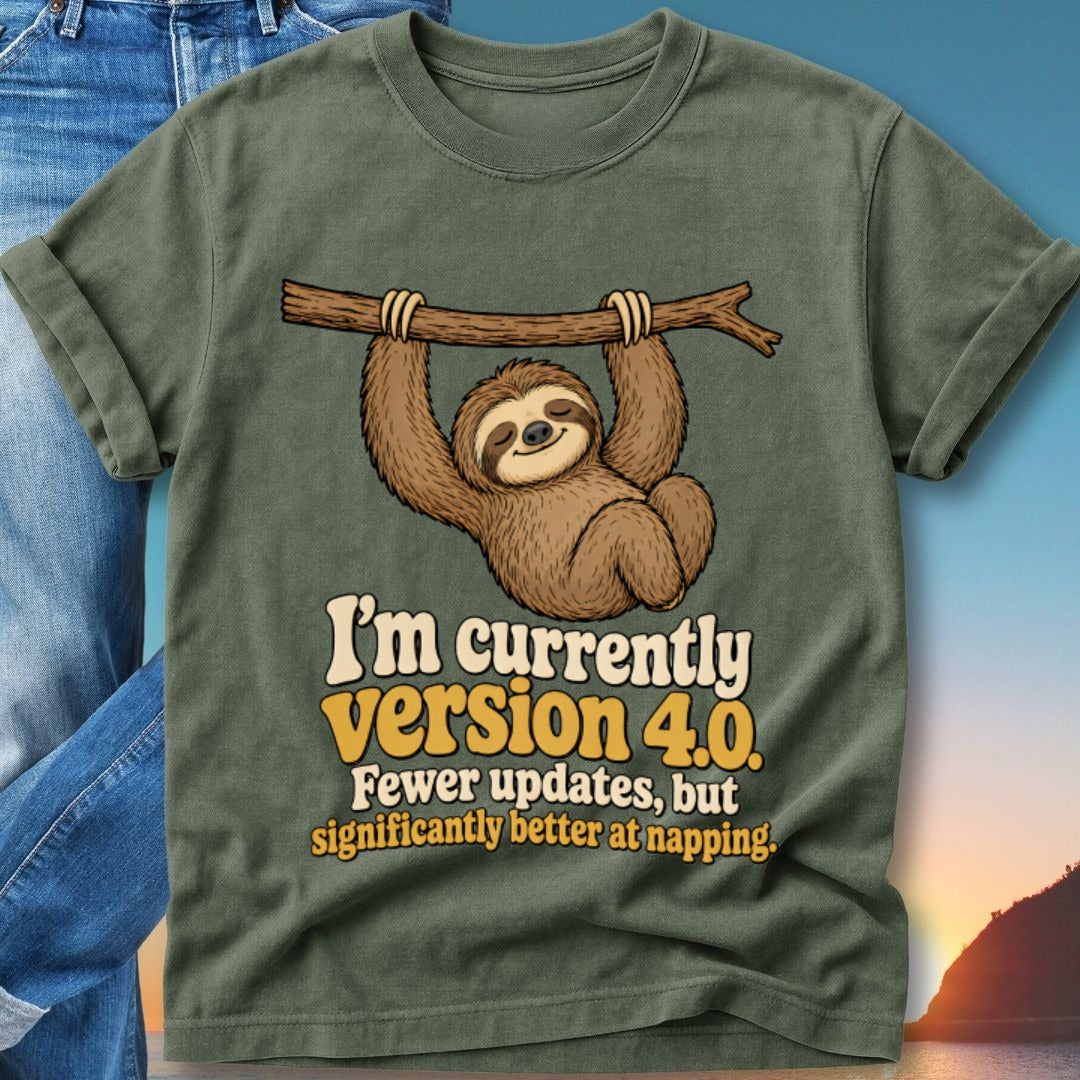 T-shirt with sloth hanging from a branch, text reads "I'm currently version 4.0. Fewer updates, but significantly better at napping."