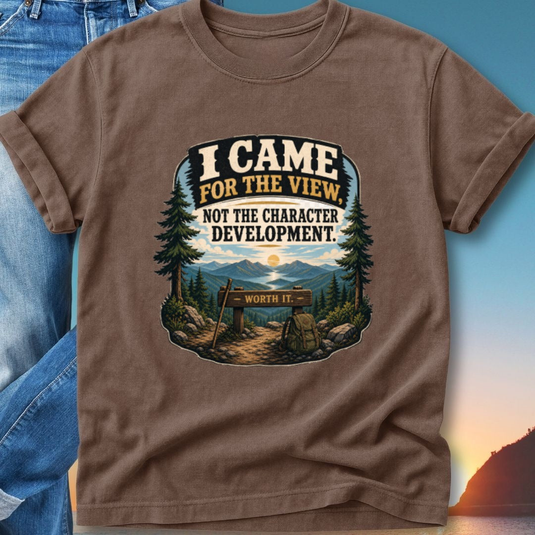 T-shirt with "I came for the view, not the character development. Worth it." text and outdoor scene.