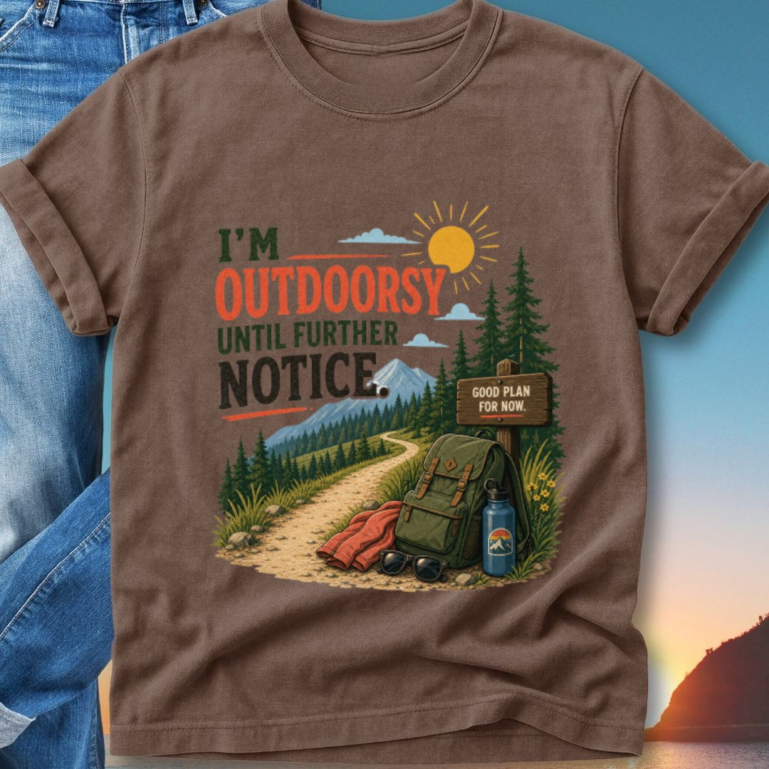 T-shirt with text "I'M OUTDOORSY UNTIL FURTHER NOTICE" and outdoor scene.