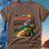 T-shirt with text "I'M OUTDOORSY UNTIL FURTHER NOTICE" and outdoor scene.