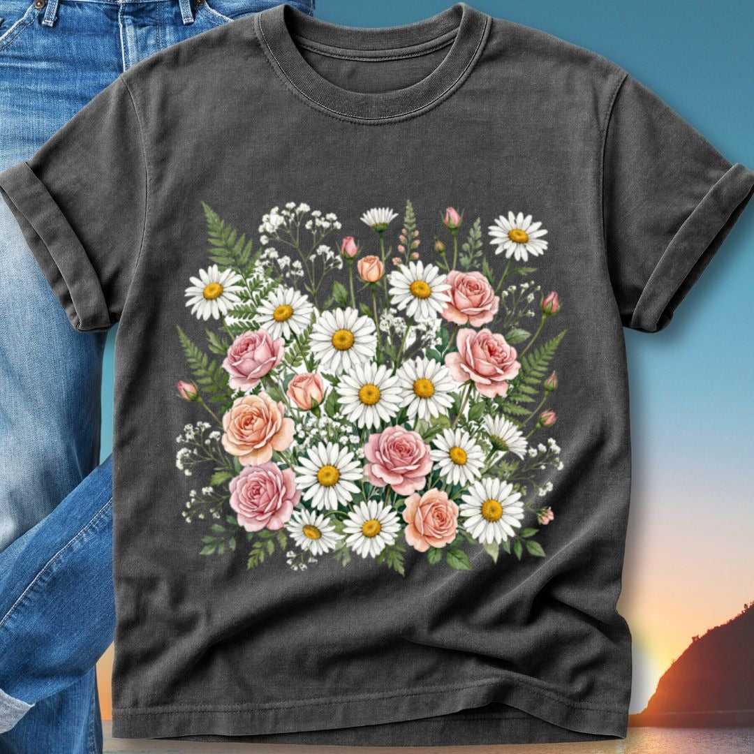 Dark t-shirt with a watercolor floral design of daisies and roses.