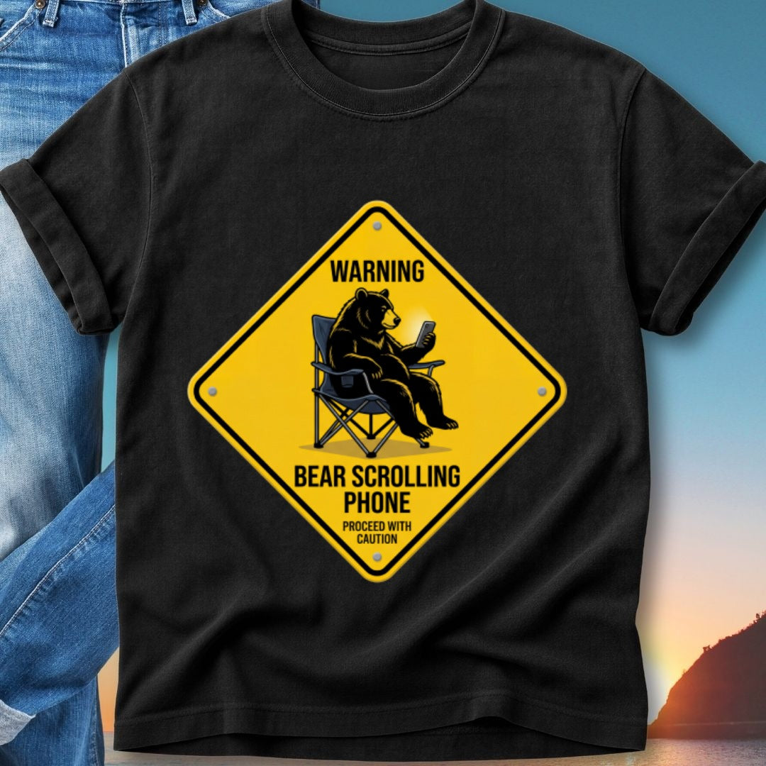 Yellow warning sign with a bear sitting and scrolling on a phone.