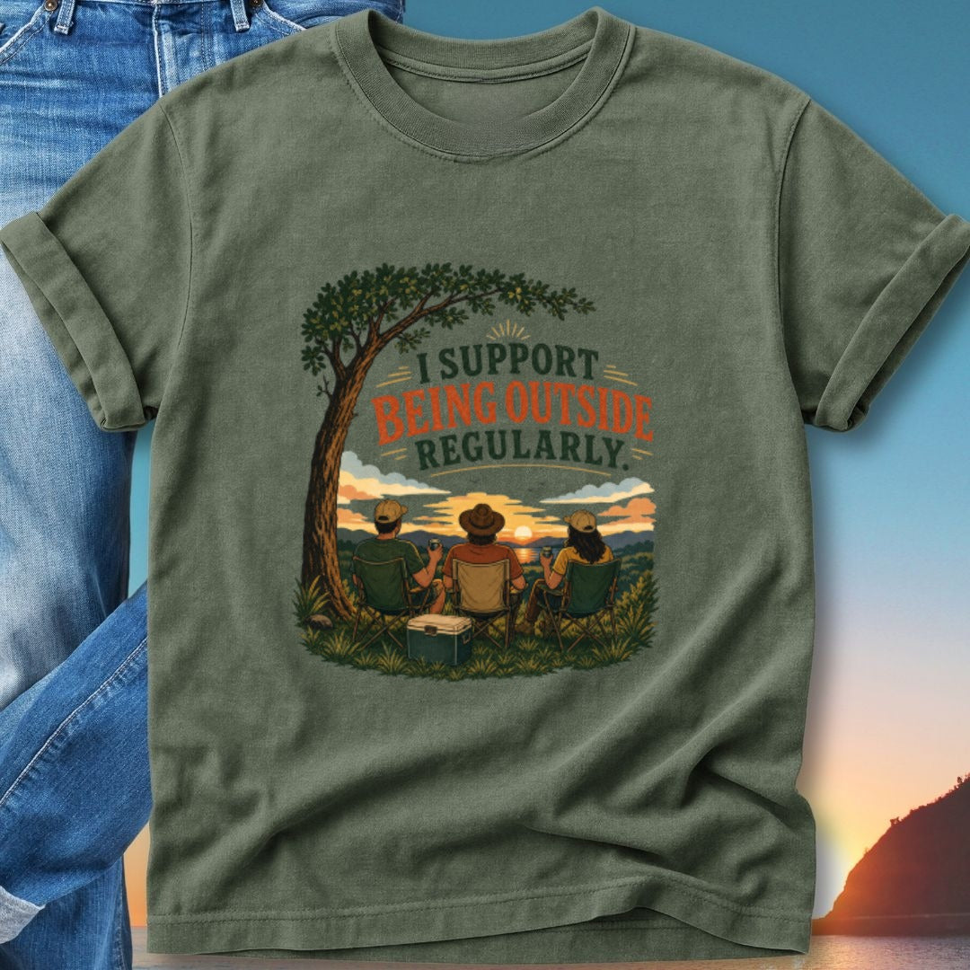 T-shirt with graphic of people sitting outside watching a sunset.