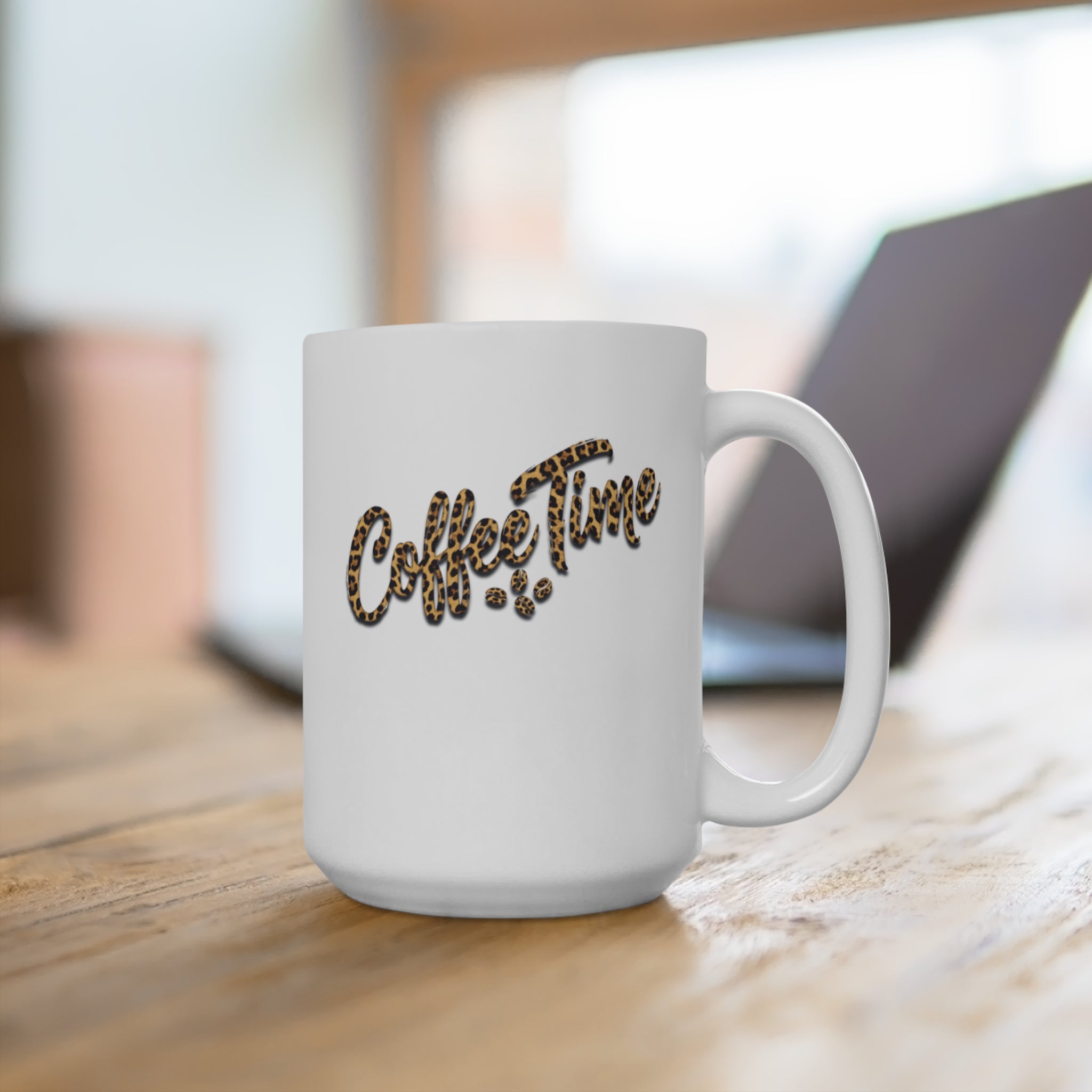 White coffee mug with "Coffee Time" text in leopard print.