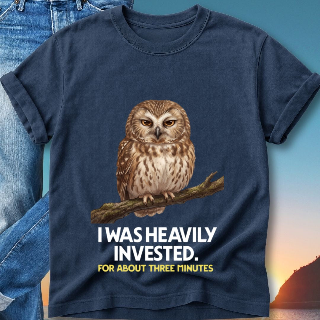 Dark blue t-shirt with owl graphic and text "I WAS HEAVILY INVESTED. FOR ABOUT THREE MINUTES."