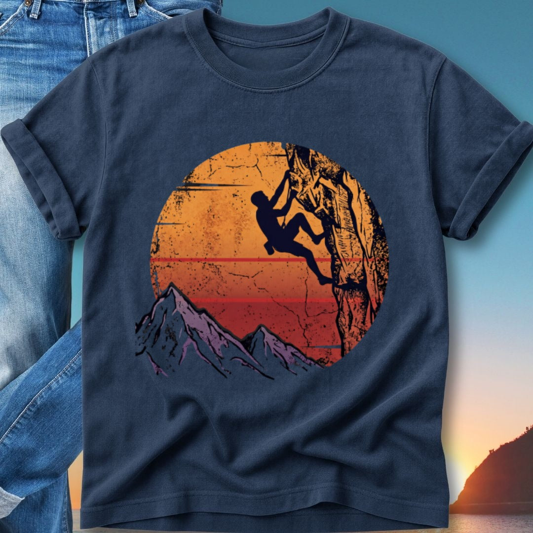 Dark blue t-shirt with climber silhouette against sunset and mountains.