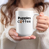 White mug with "Puppies and Coffee" and a paw print logo.