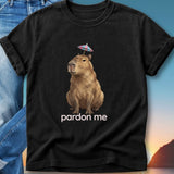 Capybara wearing a small umbrella on its head, with "pardon me" text.