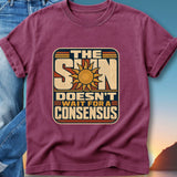 T-shirt with "The Sun Doesn't Wait For A Consensus" text and sun graphic.