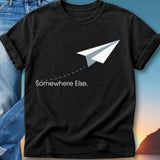 Black t-shirt with white paper airplane and text "Somewhere Else."