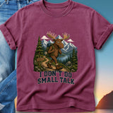 Moose hiking with backpack, mountains, and lake, text "I DON'T DO SMALL TALK".