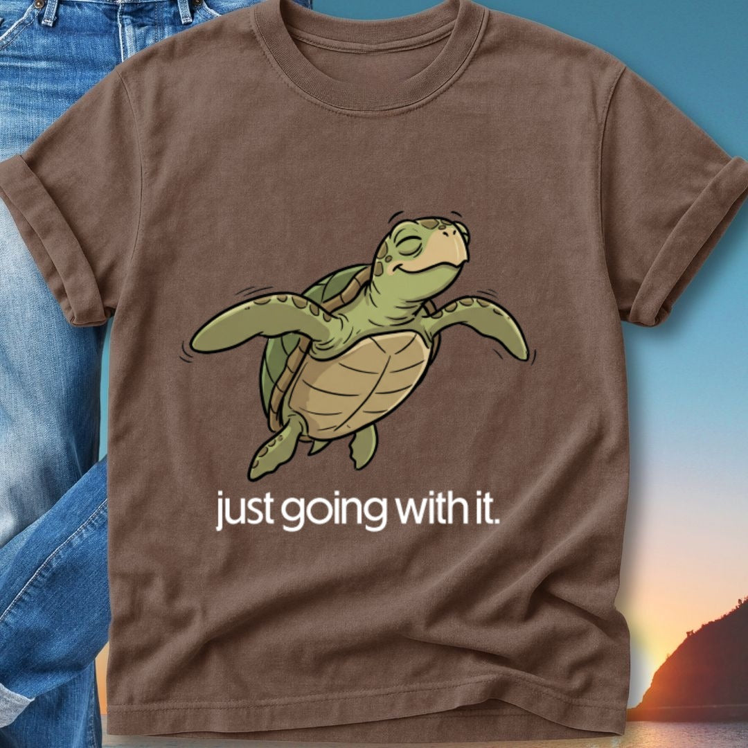 Brown t-shirt with cartoon sea turtle and text "just going with it."
