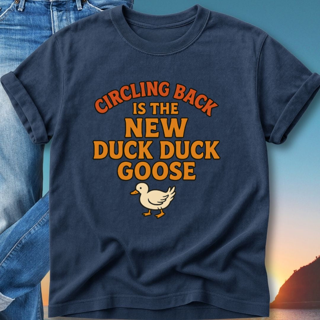Navy t-shirt with "Circling Back Is The New Duck Duck Goose" and a goose graphic.