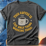 T-shirt with "This coffee is the only thing working today" text and a smiling coffee mug.