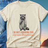 T-shirt with raccoon holding a berry, text reads "I'm not ignoring you, I'm just currently buffering in the kitchen."