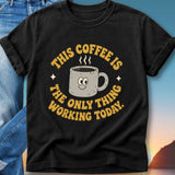 Black t-shirt with "This coffee is the only thing working today" text and cartoon coffee mug.