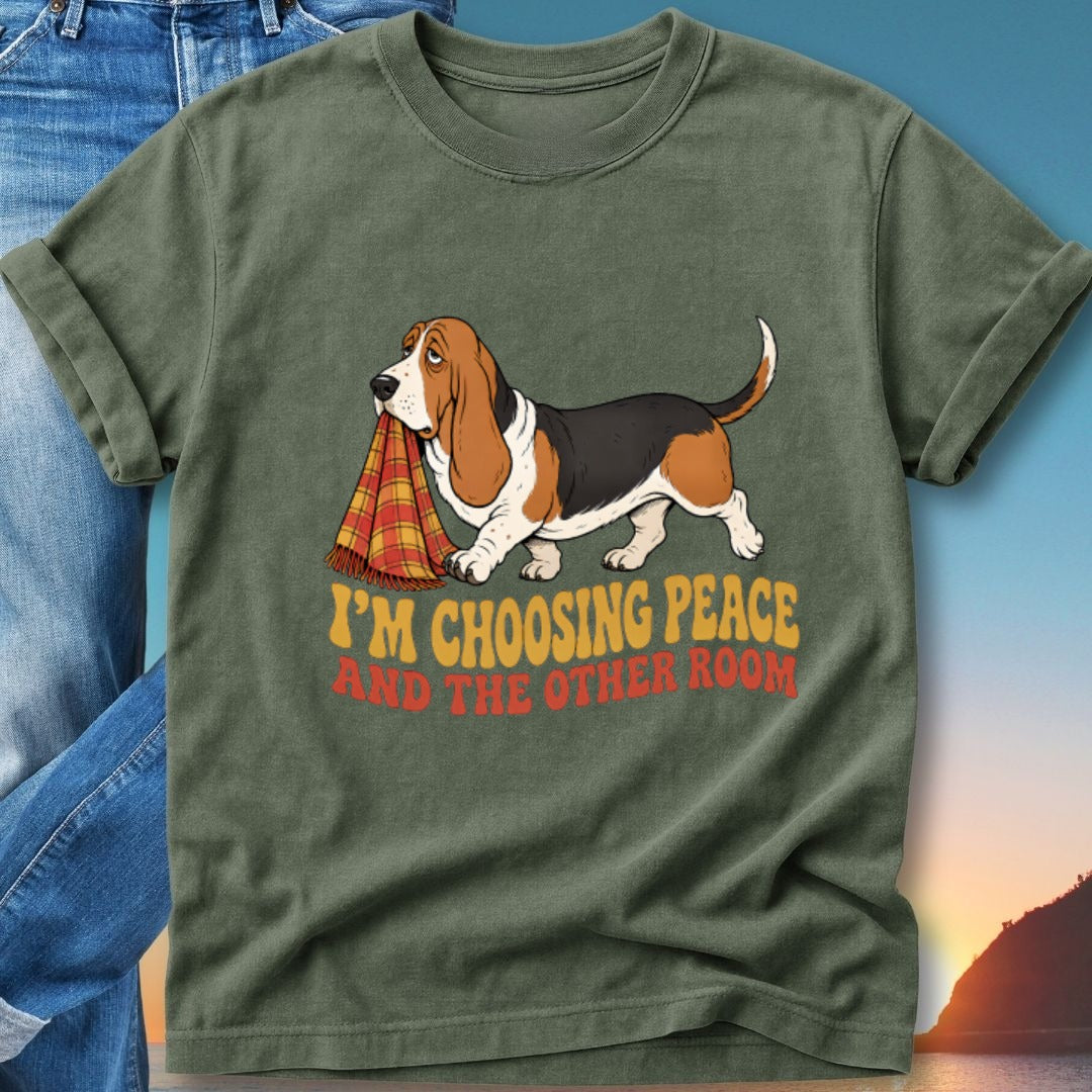 Green t-shirt with a Basset Hound holding a blanket and text that reads "I'm choosing peace and the other room".