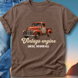 Brown t-shirt with vintage orange truck graphic and text "Vintage Engine".