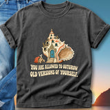 Dark t-shirt with seashell castle and text "YOU ARE ALLOWED TO OUTGROW OLD VERSIONS OF YOURSELF."