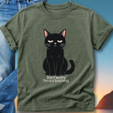 Black cat with crossed arms and text "Don't worry I'm not listening."