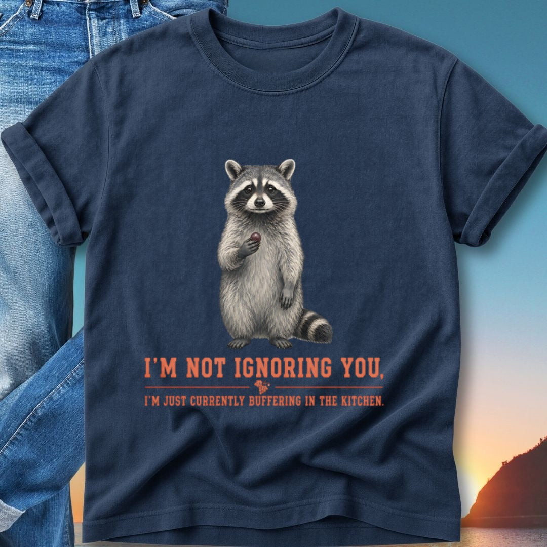 Navy t-shirt with raccoon holding berry and text "I'm not ignoring you, I'm just currently buffering in the kitchen."