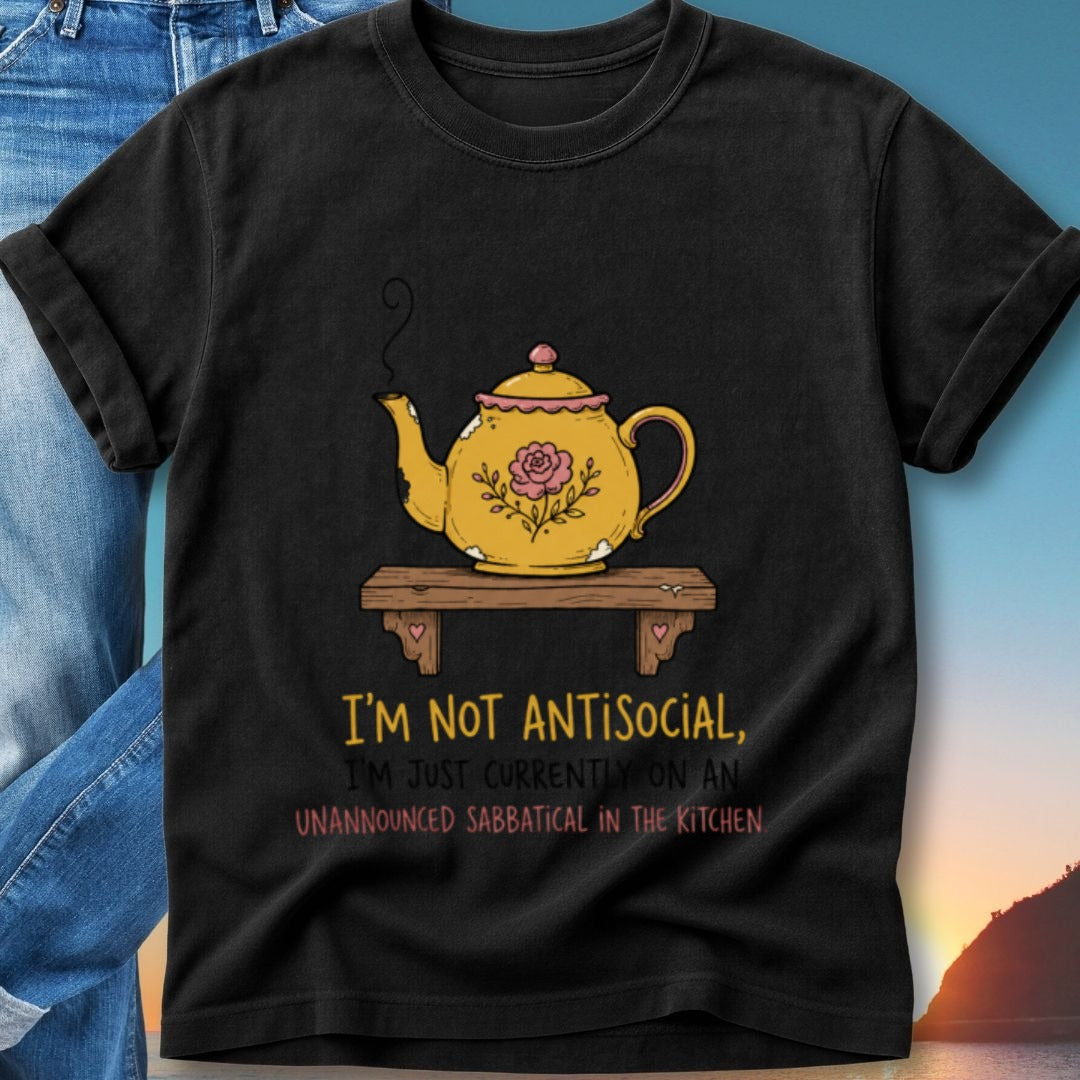 T-shirt with yellow teapot graphic and text about kitchen sabbatical.
