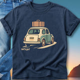 Dark blue t-shirt with a vintage car packed with luggage on a sunset background.
