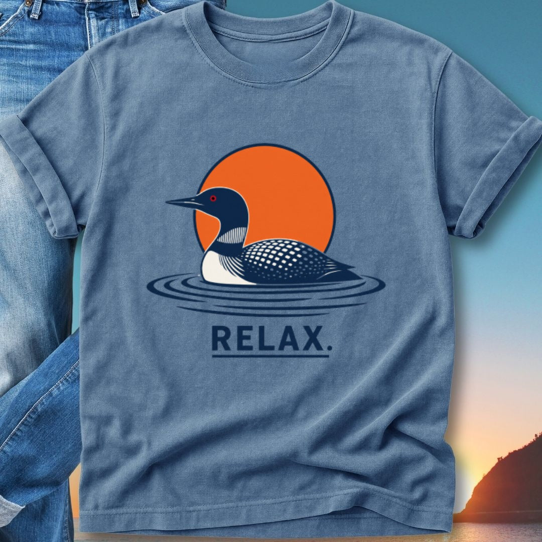 Loon on water with orange sun and "RELAX." text.