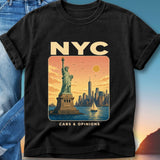 Black t-shirt featuring a vintage NYC skyline with Statue of Liberty and sailboat.