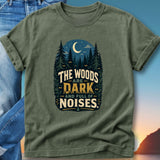 Green t-shirt with a dark forest and moon design, text reads "The woods are dark and full of noises."