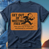 Dark blue t-shirt with orange rectangle featuring a cartoon man running and text "Get Out of Meeting Free".