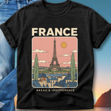 Black t-shirt featuring Eiffel Tower illustration with "FRANCE" and "BREAD & INDIFFERENCE" text.