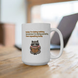 White mug with raccoon reading a book and text: "today I'm doing nothing tomorrow I'm doing something then repeating today".