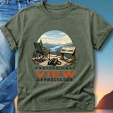 Green t-shirt with "Professional View Appreciator" text and scenic overlook illustration.