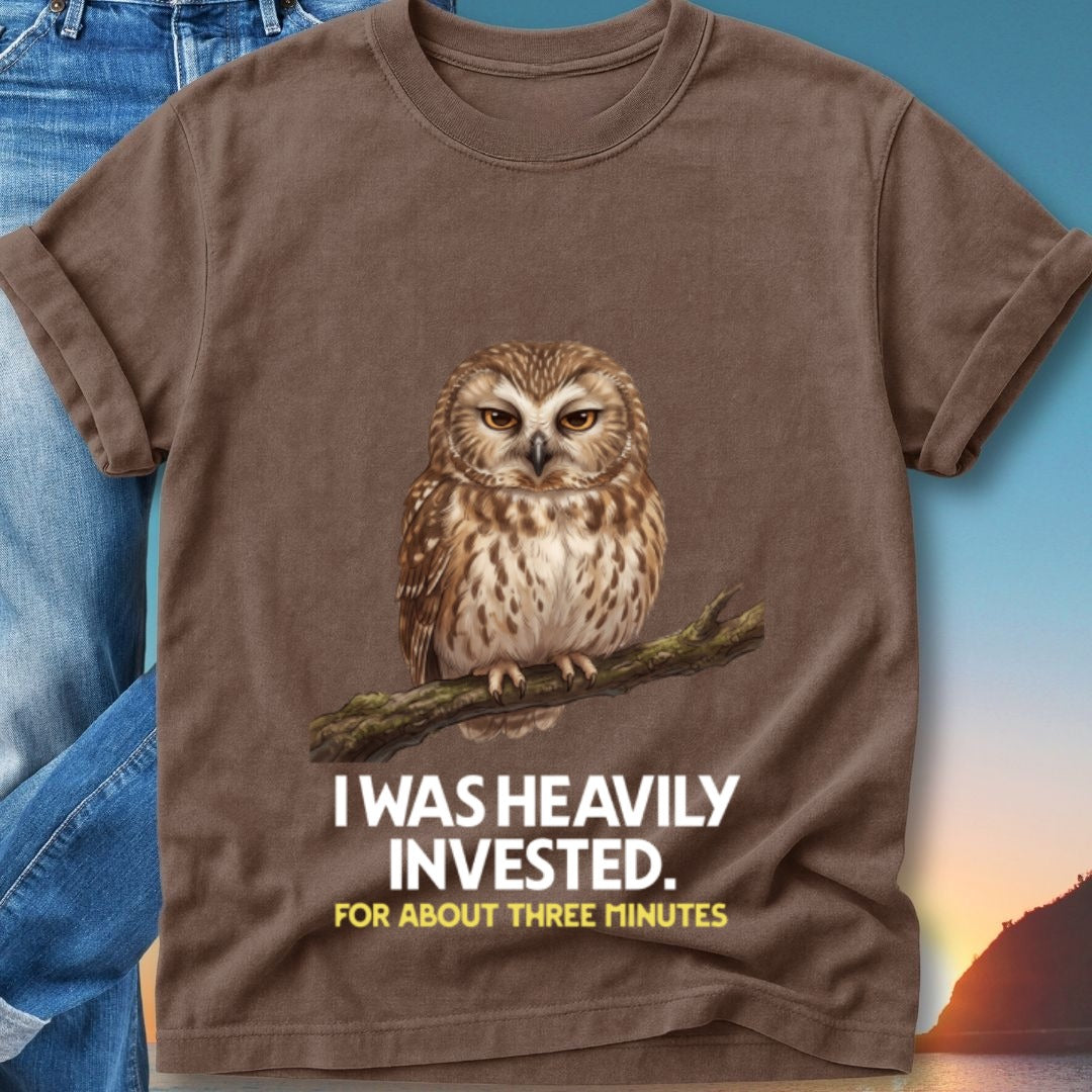 Brown t-shirt with an owl perched on a branch and text.