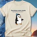 Cream t-shirt with a cartoon penguin wearing a blue beanie and text "Decisions were made I had nothing to do with it".