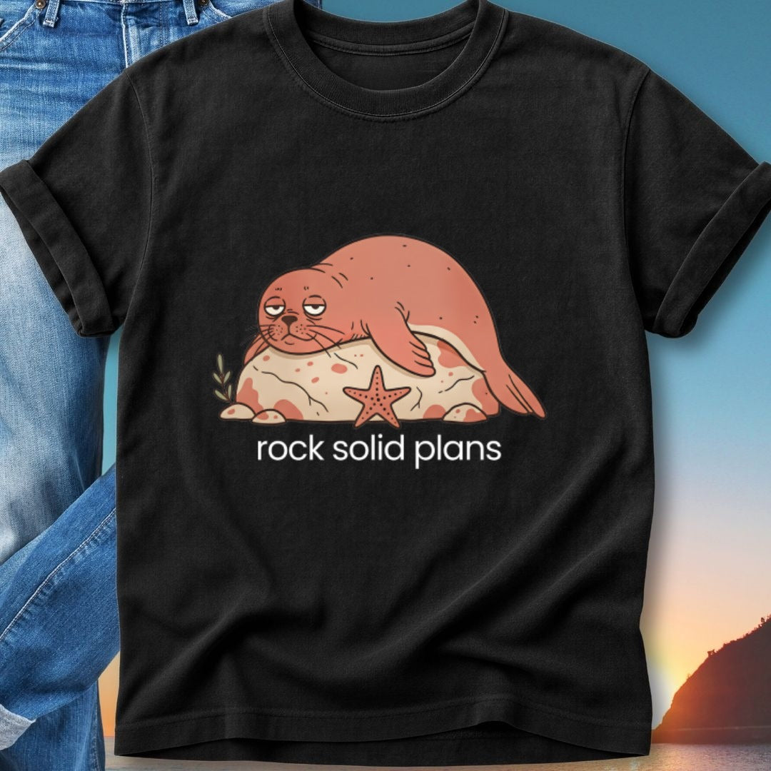 T-shirt with a seal resting on a rock next to a starfish, "rock solid plans" text.