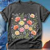 Dark t-shirt with a watercolor floral bouquet featuring poppies, roses, and ferns.