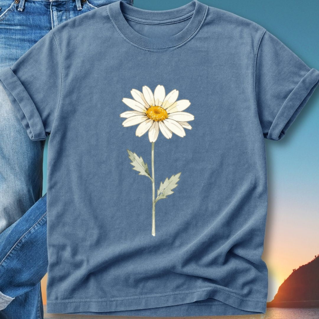 Blue t-shirt with a realistic daisy illustration and green stem.